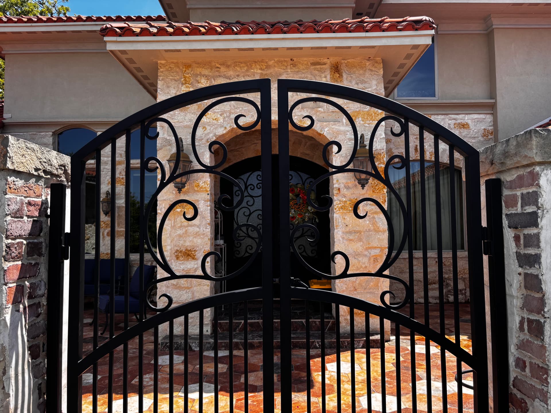 Gallery photos for Custom Double-Arch Iron Gate with Hand-Rolled Scrollwork: Image #3